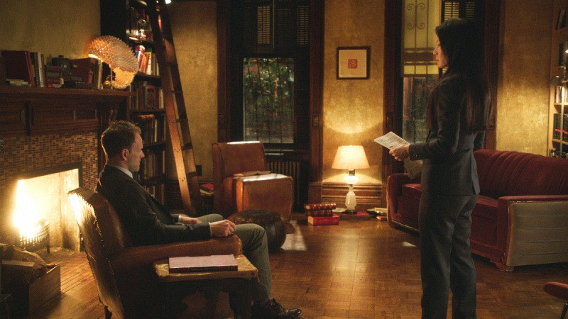 Sherlock et Watson face à la cheminée